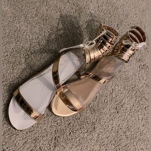New Bamboo women’s flat lace up Rose Gold sandal